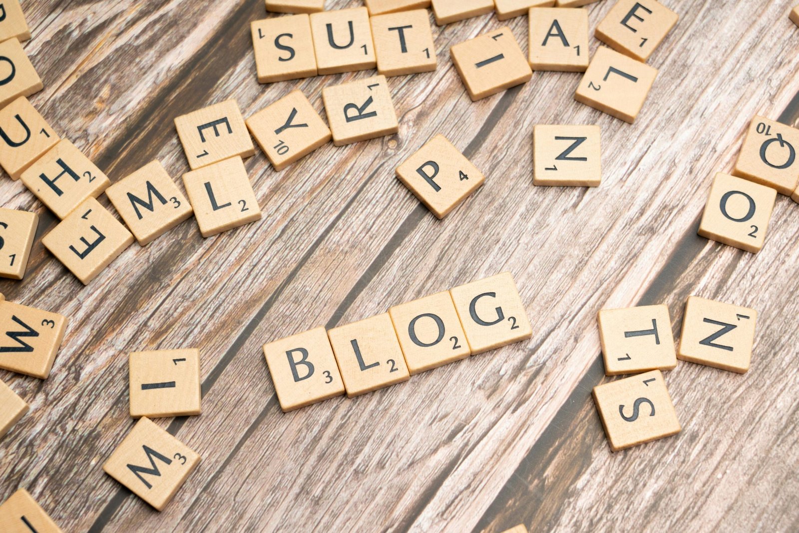 Person working on documents and laptop, symbolizing Zappy Tools blog tutorials